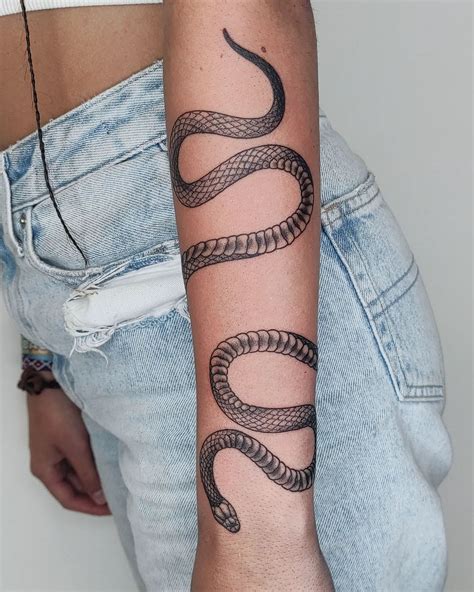 red gucci snake tattoo|snake wrap around arm tattoo.